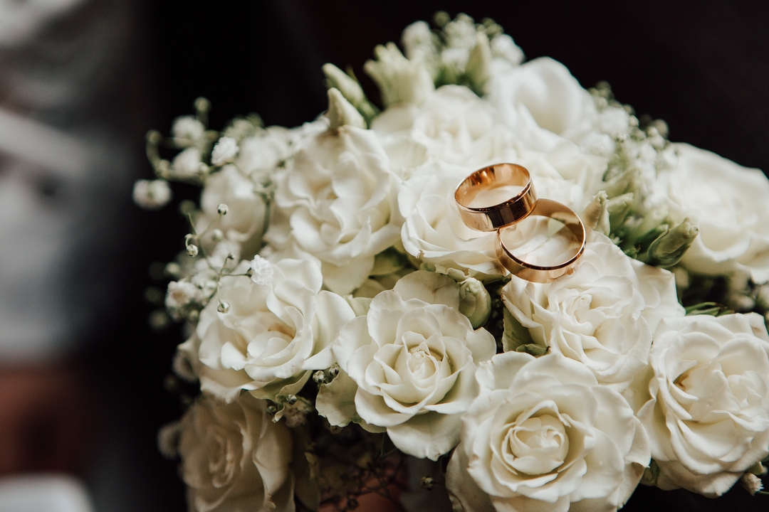 Wedding,Rings,On,The,Wedding,Bouquet,Of,White,Roses. Ready to create the wedding of your dreams